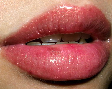 Chanel lipgloss Spark This color looks amazing on everyone!