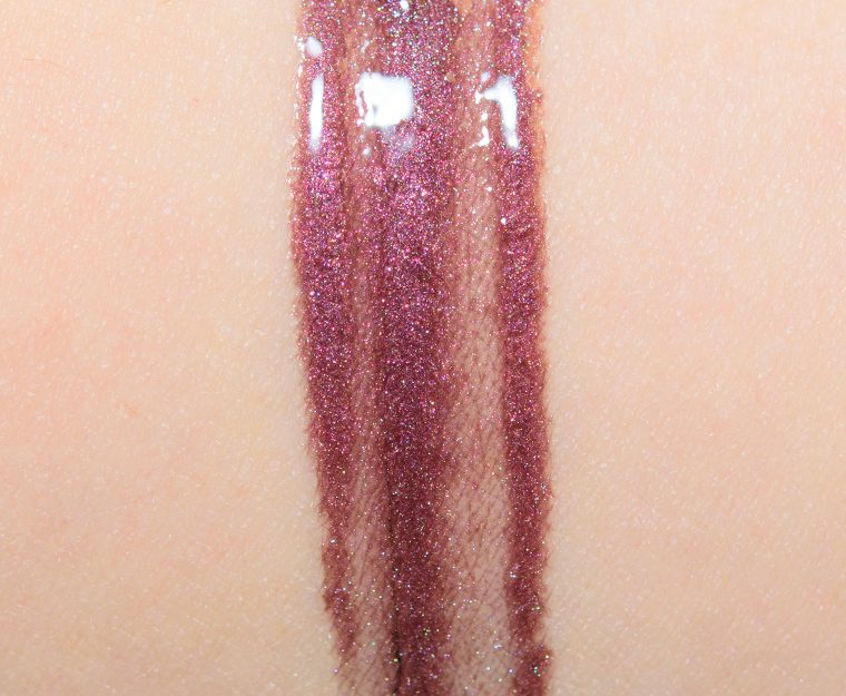 <p class="text-center">MAC Midnight Dip Lipglass</p>