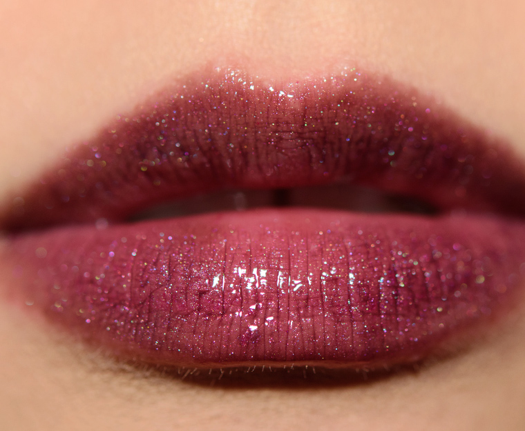 <p class="text-center">MAC Midnight Dip Lipglass</p>
