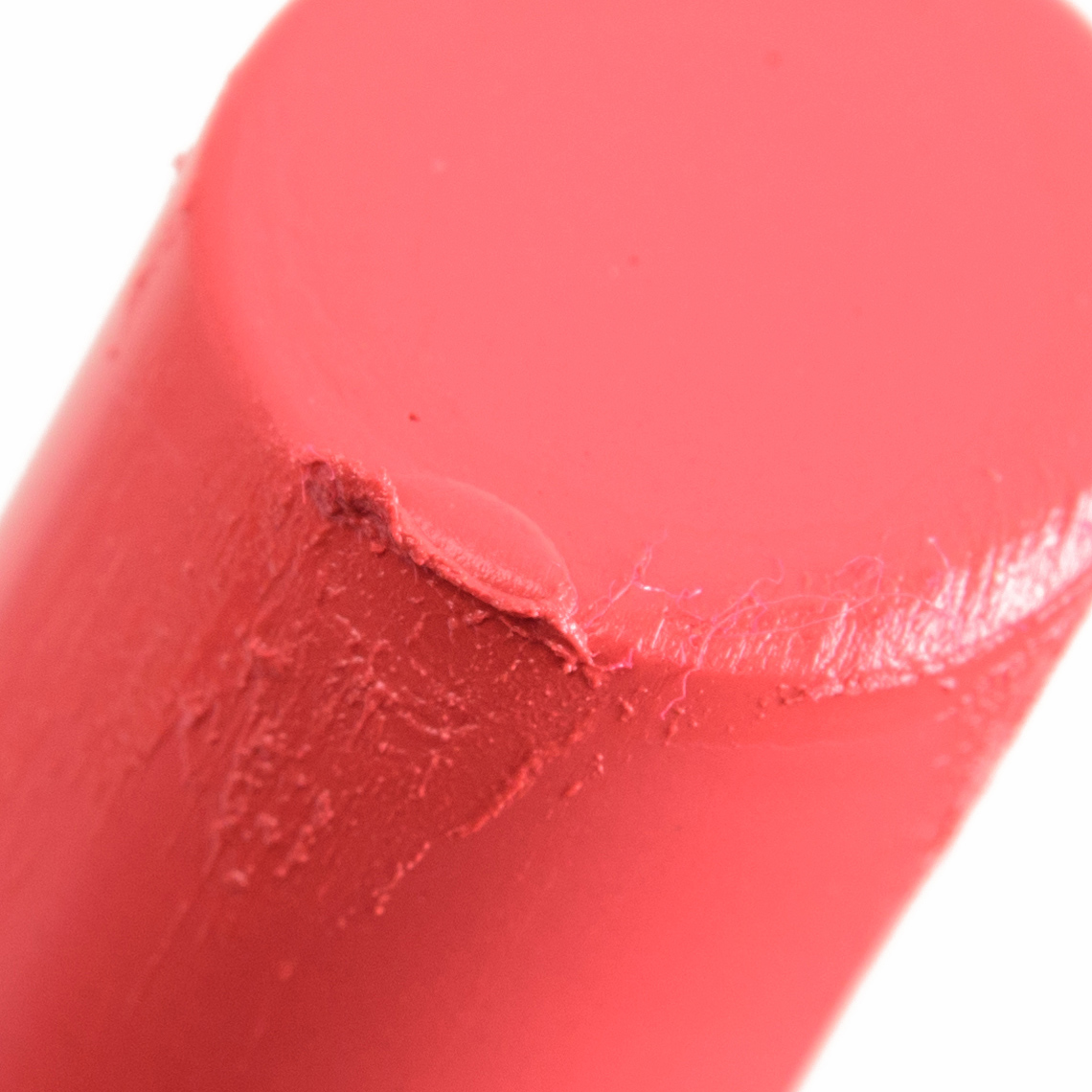 Fibers in Lipsticks - Makeup Geek Giddy (longer fiber embedded on the bottom edge of the slant)