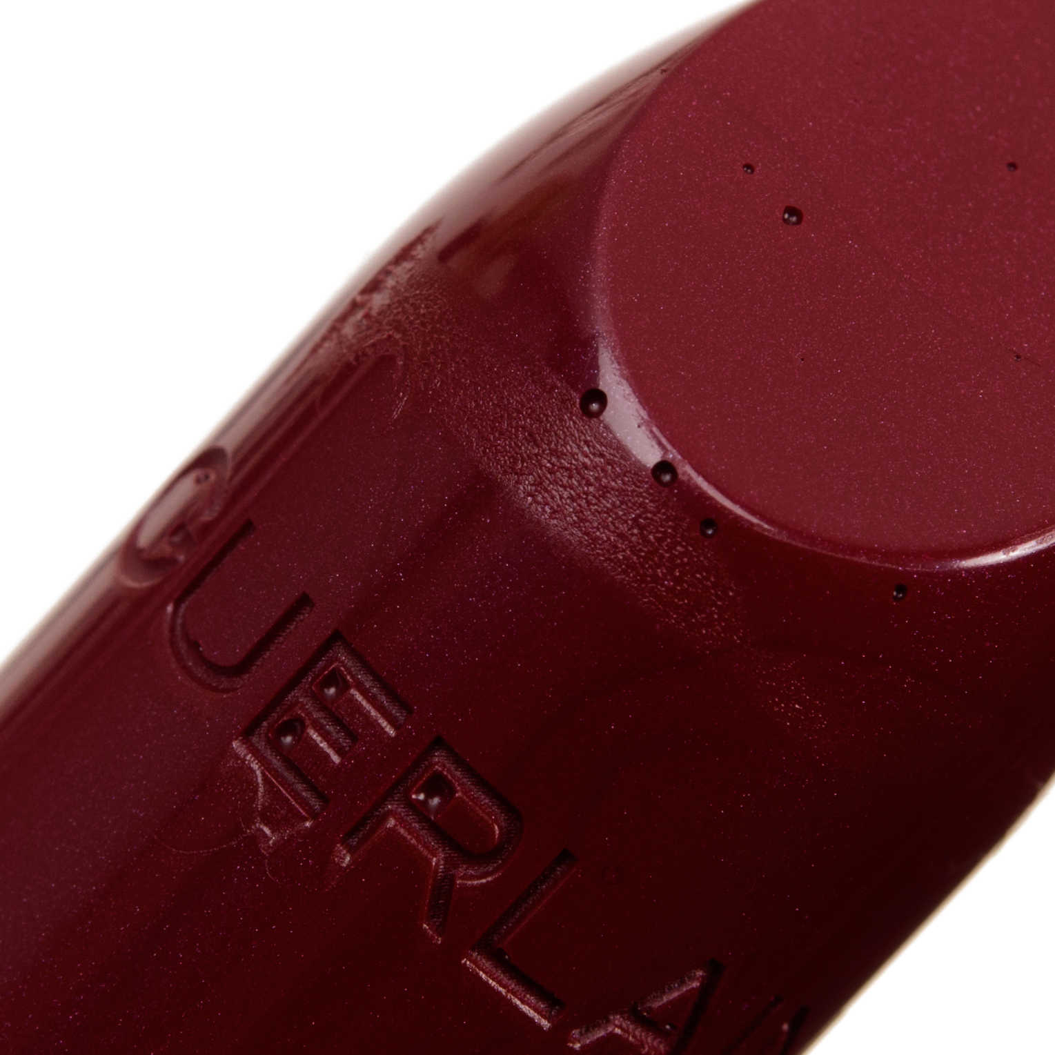 Holes in Lipsticks - Guerlain #23 (larger but not too far from normal)