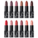 Row 1: Heroine, Hot Channel, Hot Kiss, Hot Voodoo, Immortal Red, Impulse; Row 2:  Inappropriate Red, Instant Crush, Intrigue, Jolie Mome, License to Love, Little Princess