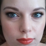 Summer look with blue eyeliner and coral lips