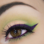 Green MakeUp With Purple Eyeliner