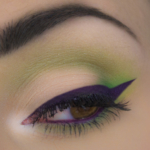 Green MakeUp With Purple Eyeliner