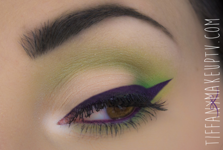 Green MakeUp With Purple Eyeliner