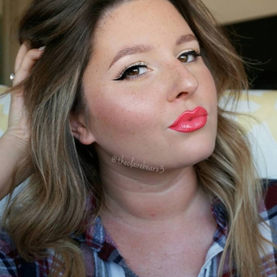 Simple winged liner with bright lips for spring