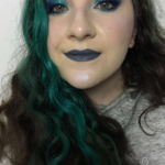 Blue eyes and stone grey lips