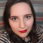 Bold red lips & slight winged eyeliner