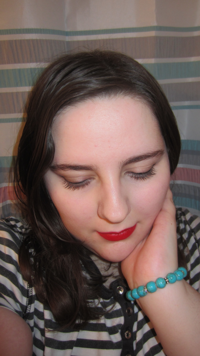 Bold red lips & slight winged eyeliner