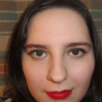 Bold red lips & slight winged eyeliner