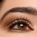 A Neutral Brown Look With A Pop Of Gold Glitter